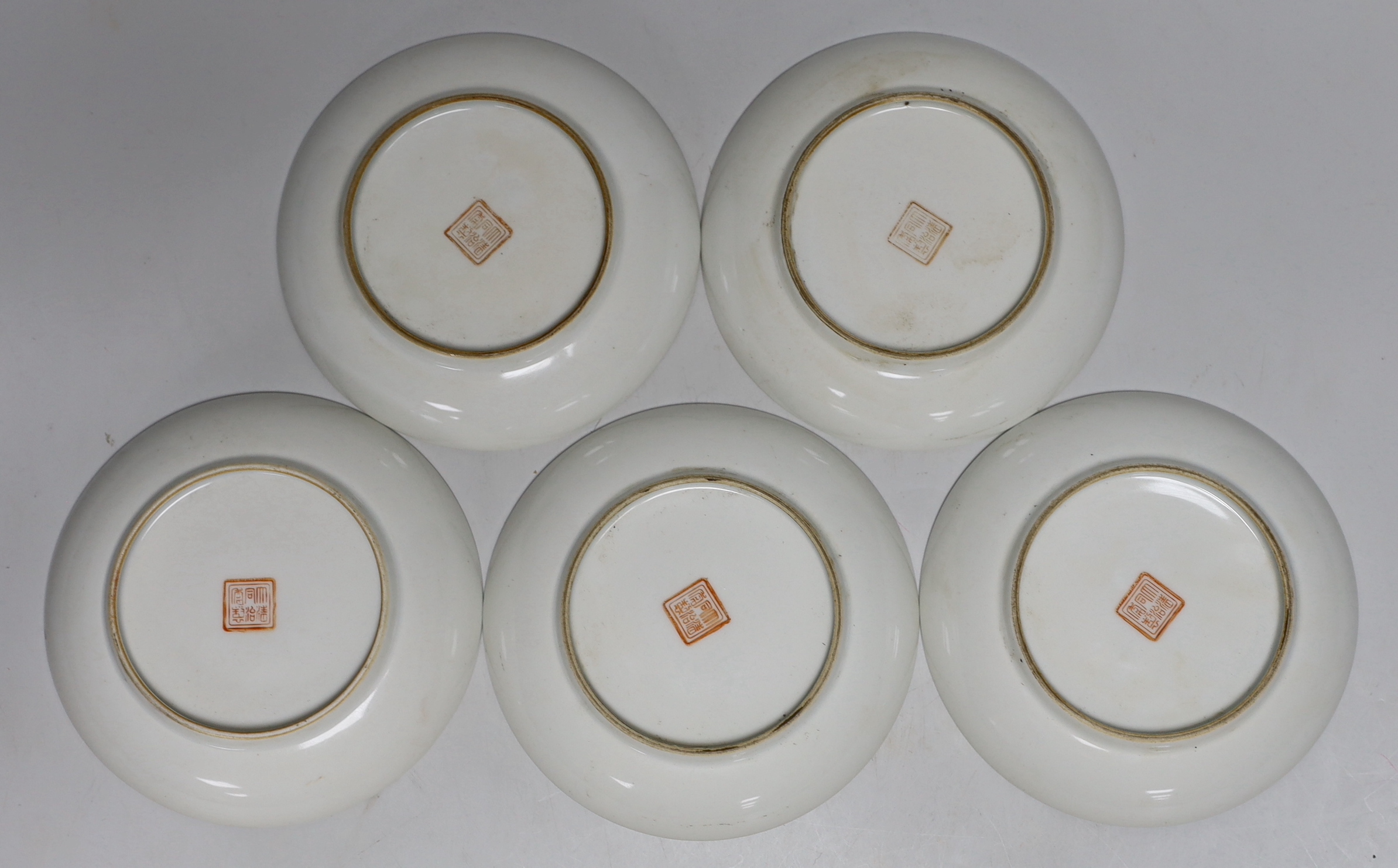 A set of five Chinese enamelled porcelain saucer dishes, decorated with figures and elders, each 13cm in diameter
